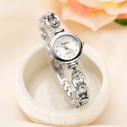 Women's watch with pearl alloy bracelet